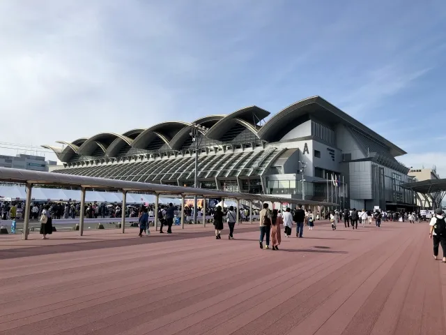 Visitors walking in front of Marine Messe Fukuoka